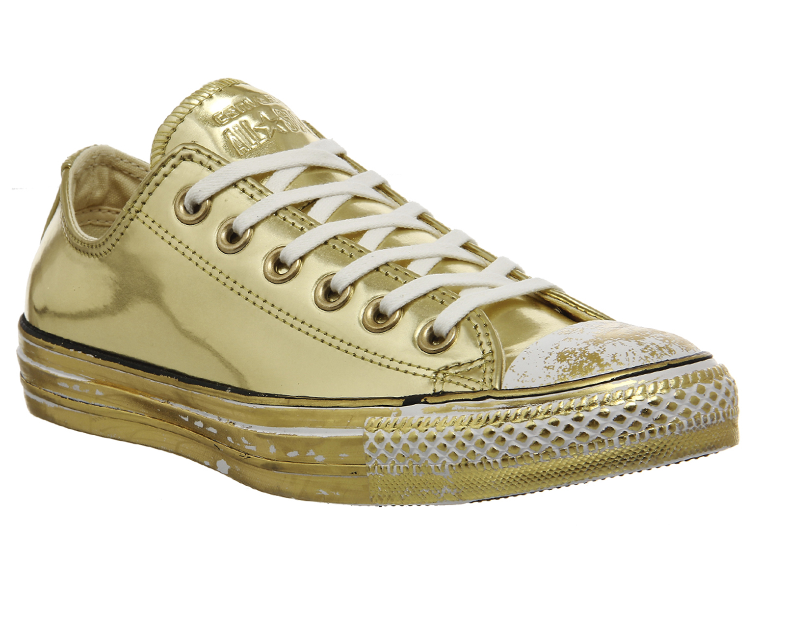 white and gold leather converse